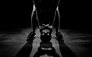 Kettlebell Workout Preparation Dark Background Wallpaper