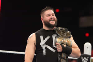Kevin Owens Smiling Champion Wallpaper