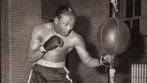 Kid Gavilan Training Small Punching Bag Wallpaper