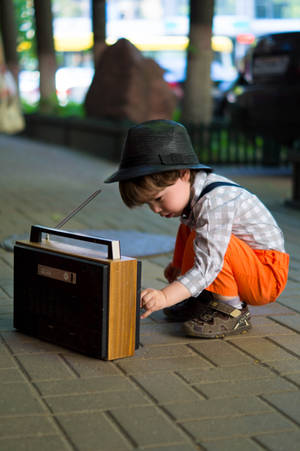 Kid With Radio Music 4k Wallpaper