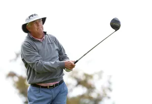 Kirk Triplett Holding Golf Club Wallpaper