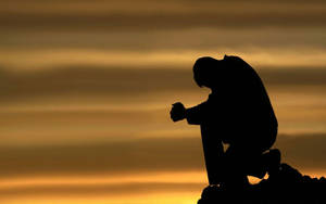 Kneeling Silhouette Sad Person Wallpaper