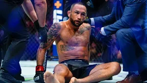 Knocked Out American Ufc Fighter Frankie Edgar Wallpaper
