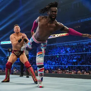 Kofi Kingston In Action Against The Miz Wallpaper