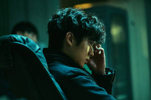 Korean Actor Choi Woo Shik In A Villainous Role Wallpaper