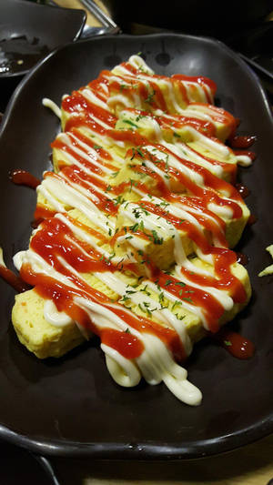 Korean Egg Rolls With Ketchup And Mayonnaise Wallpaper