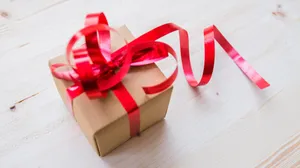 Kraft Box Long Red Ribbon Photography Wallpaper