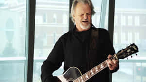 Kris Kristofferson Performing Guitar Wallpaper