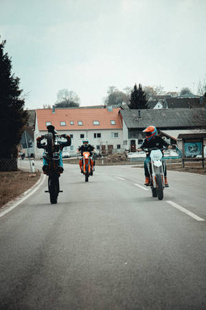 Ktm Bike Riding Trio Wallpaper