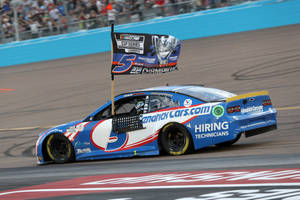 Kyle Larson’s Blue Car And Flag Wallpaper