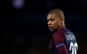 Kylian Mbappe Side View Portrait Wallpaper