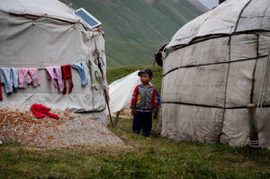 Kyrgyzstan People In The Mountains Wallpaper