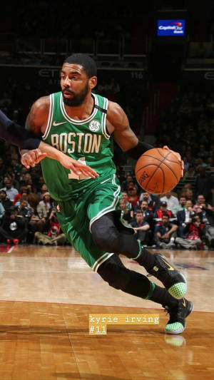Kyrie Irving Playing On Basketball Tournament Wallpaper