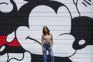 Lady On Mickey Mouse Wall Wallpaper