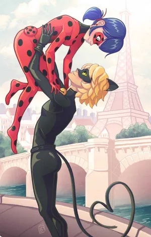 Ladybug And Cat Noir Kiss In Paris Wallpaper