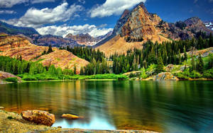 Lake View With Jagged Mountain Wallpaper