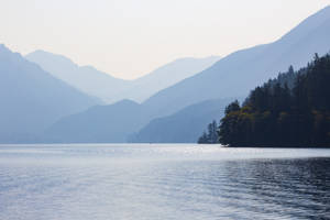 Lake With Mountain Silhouettes Wallpaper