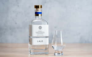 Lalo Tequila Bottleand Glass Wallpaper