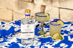 Lalo Tequila Bottleand Margaritas Wallpaper