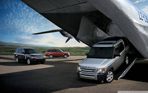 Land Rover And Plane Wallpaper