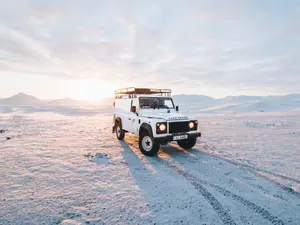 Land Rover In Snow Wallpaper