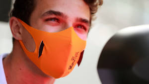 Lando Norris Orange Mask Wallpaper