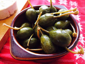 Large Capers With Stems In Bowl Wallpaper