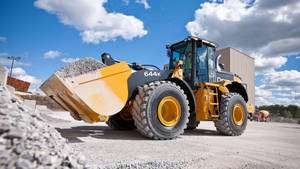 Large Wheel Loader In A Construction Wallpaper