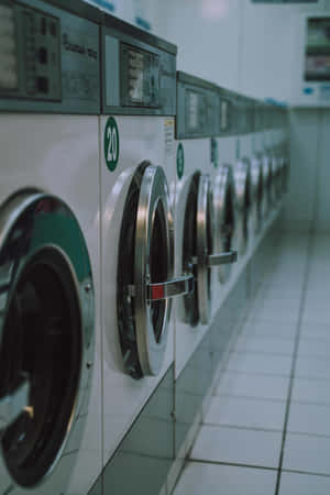 Laundromat Rowof Washing Machines.jpg Wallpaper