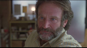 Legendary Actor Robin Williams In A Memorable Movie Scene Wallpaper