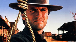 Legendary Clint Eastwood In A Pensive Mood In 'the Good, The Bad And The Ugly' Wallpaper