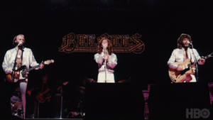 Legendary Pop Band Bee Gees In Concert Wallpaper