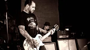 Legendary Rock Band Social Distortion In Concert Wallpaper