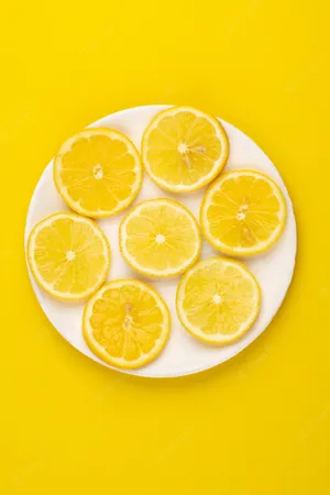 Lemon Slices On Plate Yellow Background Iphone Wallpaper