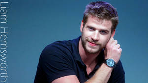 Liam Hemsworth In Blue Background Wallpaper