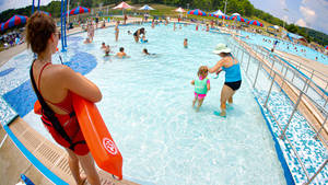 Lifeguard Kiddie Pool On Duty Wallpaper