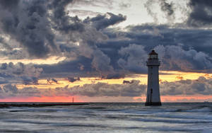 Lighthouse Cloudy Sunset Wallpaper