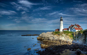 Lighthouse On The Cliffs Wallpaper