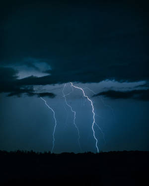 Lightning Strikes And Storm Clouds Wallpaper