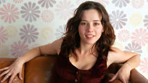 Linda Cardellini Captivating Smile In Red Dress Wallpaper