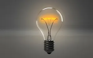 Lit Iphone Bulb Wallpaper
