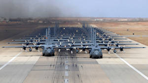Lockheed C-130s On Runway Wallpaper