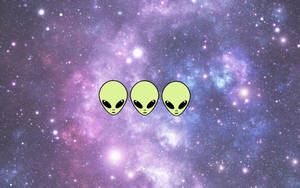 Logo Art Featuring A Friendly Alien Wallpaper