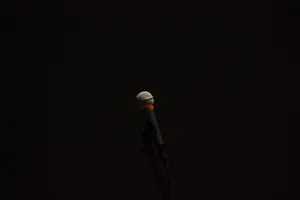 Lone Microphone In The Dark Wallpaper