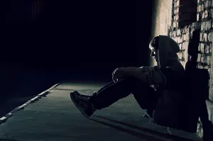 Loner Man In Hoodie Wallpaper