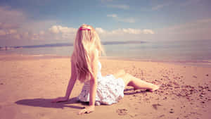 Long Blonde Haired Girl On Beach Wallpaper