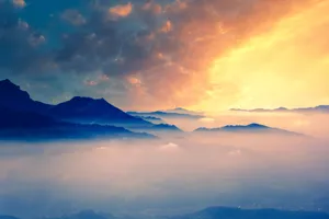 Look Up To The Sky And Its Beautiful Dreamlike Clouds Wallpaper