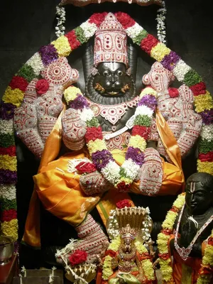 Lord Lakshmi Narasimha Statues With Garlands Wallpaper
