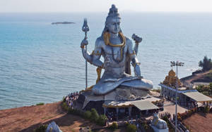 Lord Shiva 4k By The Sea Wallpaper
