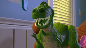 Lovable T-rex Character From Toy Story Series Wallpaper
